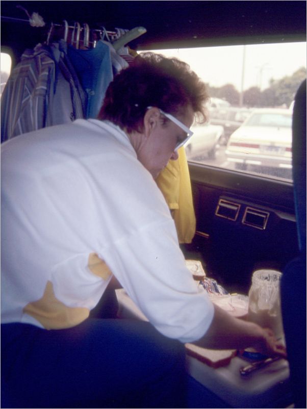 Mom in the van fixing lunch before we see the Queen Mary